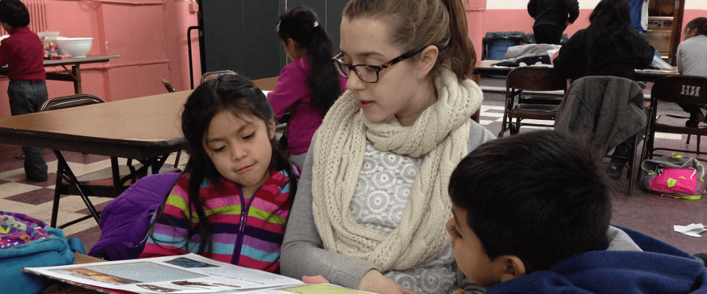 Volunteers Teaching Small Kids